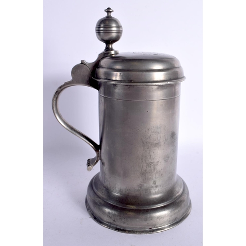 249 - A EUROPEAN PEWTER TANKARD bearing inscription to top 1777. 25 cm x 13 cm.