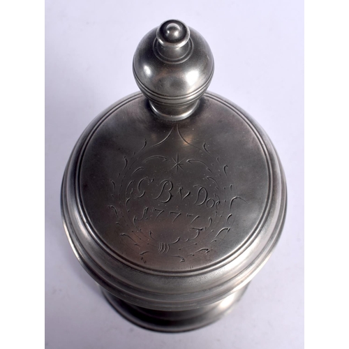 249 - A EUROPEAN PEWTER TANKARD bearing inscription to top 1777. 25 cm x 13 cm.