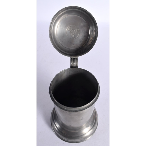 249 - A EUROPEAN PEWTER TANKARD bearing inscription to top 1777. 25 cm x 13 cm.