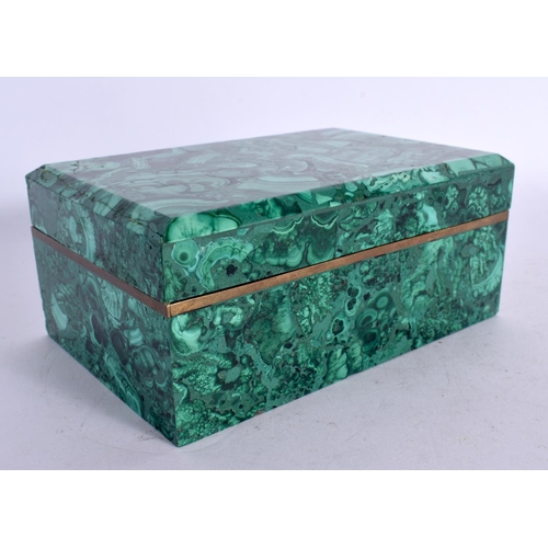 260 - A FINE EARLY 20TH CENTURY RUSSIAN MALACHITE BOX AND COVER of naturalistic form. 15 cm x 10 cm.