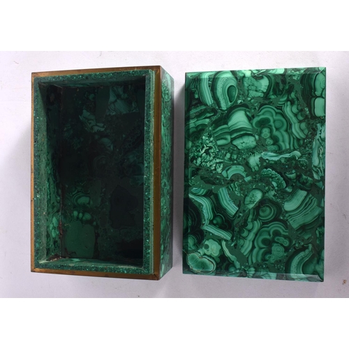 260 - A FINE EARLY 20TH CENTURY RUSSIAN MALACHITE BOX AND COVER of naturalistic form. 15 cm x 10 cm.