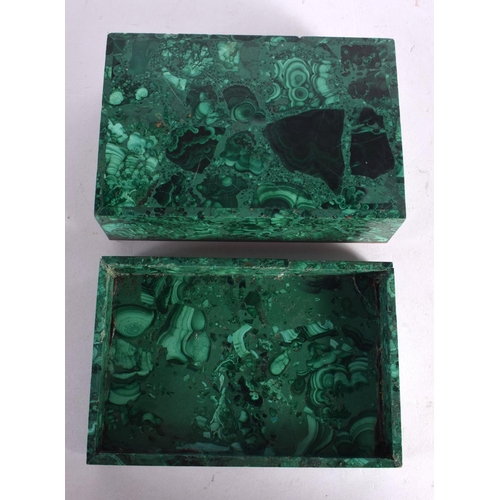 260 - A FINE EARLY 20TH CENTURY RUSSIAN MALACHITE BOX AND COVER of naturalistic form. 15 cm x 10 cm.