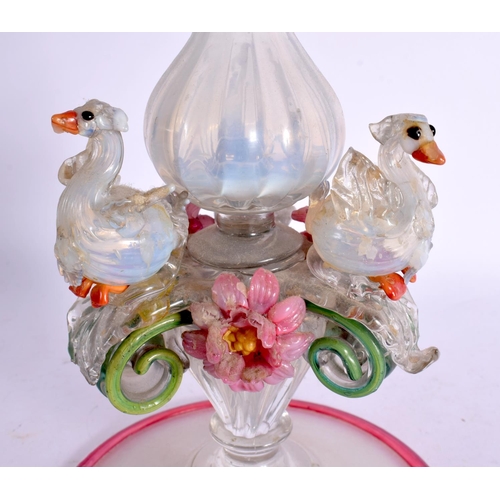 265 - AN UNUSUAL 1920S VASELINE GLASS CANDLESTICK. 61 cm high.