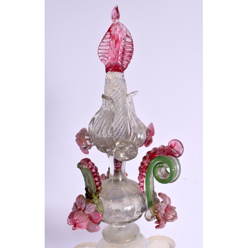 265 - AN UNUSUAL 1920S VASELINE GLASS CANDLESTICK. 61 cm high.