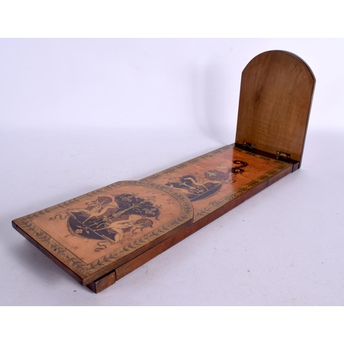 269 - AN EARLY 20TH CENTURY EUROPEAN SLIDING INLAID BOOK RACK. 64 cm long extended.