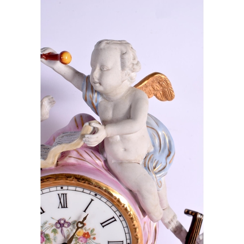 29 - A LARGE CONTINENTAL PINK AND BISQUE PORCELAIN MANTEL CLOCK embellished with flowers and vines. 42 cm... 