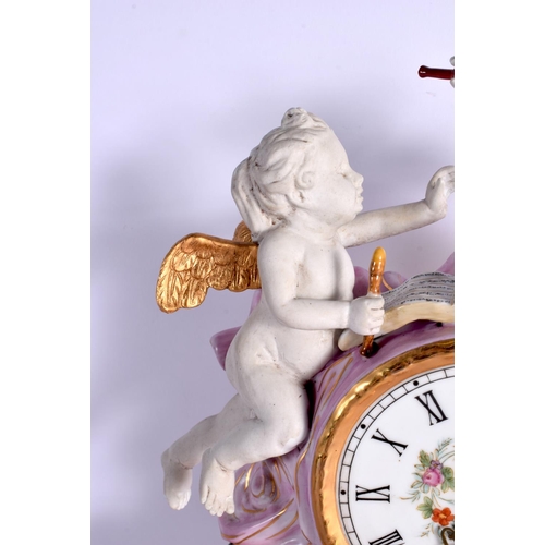 29 - A LARGE CONTINENTAL PINK AND BISQUE PORCELAIN MANTEL CLOCK embellished with flowers and vines. 42 cm... 