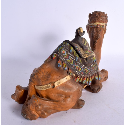 298 - A COLD PAINTED SPELTER CAMEL INKWELL. 18 cm x 16 cm.