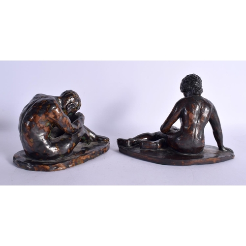 30 - A CHARMING PAIR OF 1960S ENGLISH STUDIO POTTERY FIGURES by Hough, modelled as a male and female upon... 