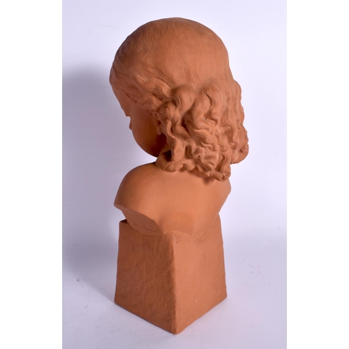 41 - AN ART DECO TERRACOTTA BUST OF A YOUNG FEMALE modelled upon a square plinth. 30 cm x 12 cm.