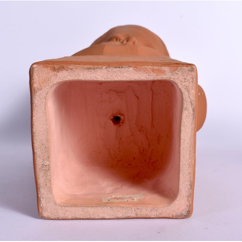 41 - AN ART DECO TERRACOTTA BUST OF A YOUNG FEMALE modelled upon a square plinth. 30 cm x 12 cm.