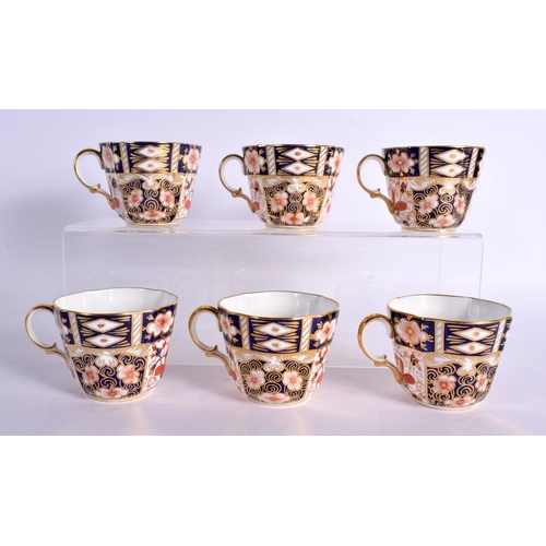 45 - SIX ROYAL CROWN DERBY IMARI CUPS AND SAUCERS. (12)