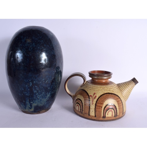 52 - A LARGE STUDIO POTTERY BLUE GLAZED VASE together with a retro teapot. Largest 28 cm high. (2)