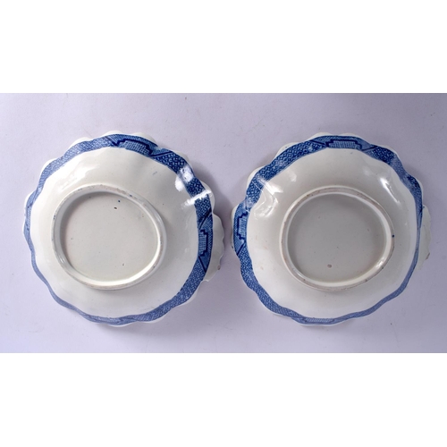 56 - A PAIR OF 19TH CENTURY ENGLISH BLUE AND WHITE DISH LEAF SHAPED DISHES. 20 cm x 20 cm.