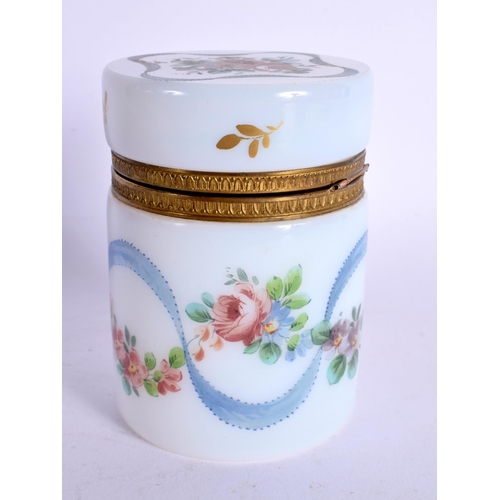 59 - AN ANTIQUE OPALINE GLASS JAR AND COVER. 10 cm high.