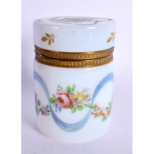 59 - AN ANTIQUE OPALINE GLASS JAR AND COVER. 10 cm high.