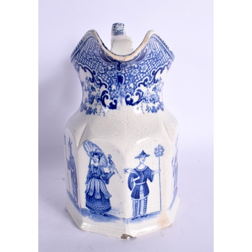 60 - AN UNUSUAL ANTIQUE BLUE AND WHITE JUG printed with figures. 17 cm high.