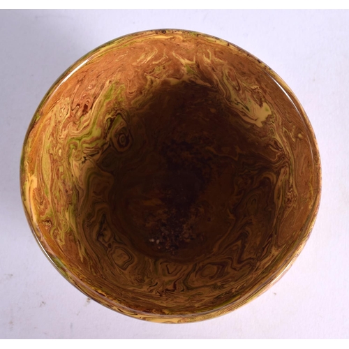 61 - A 19TH CENTURY EUROPEAN AGATE WARE CIRCULAR BOWL of mottled tone. 9 cm diameter.