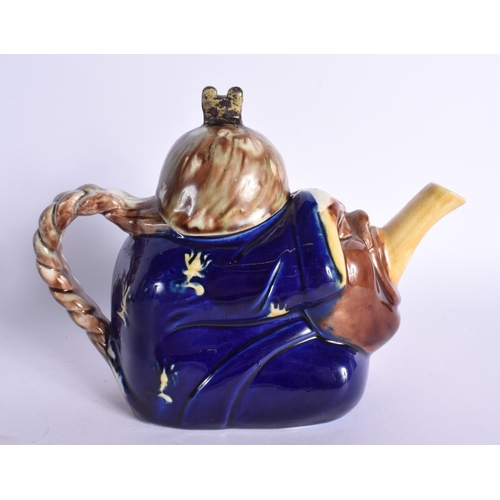 62 - A 19TH CENTURY EUROPEAN MAJOLICA TEAPOT AND COVER Possibly Minton, formed as a Chinaman. 20 cm x 15 ... 