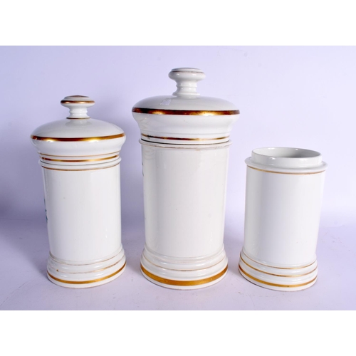 66 - THREE 19TH CENTURY CHEMIST APOTHECARY POTTERY JARS. Largest 28 cm high. (3)