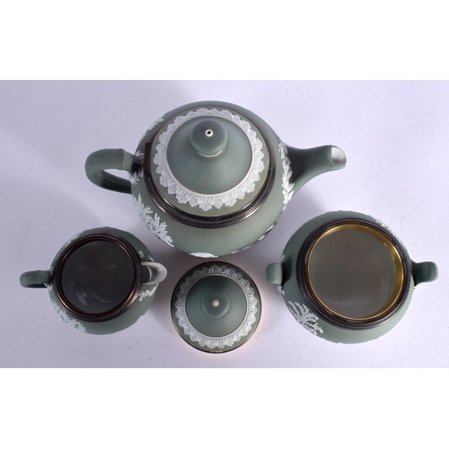 7 - A WEDGWOOD GREEN JASPERWARE THREE PIECE SILVER TEASET. Largest 14 cm wide. (3)