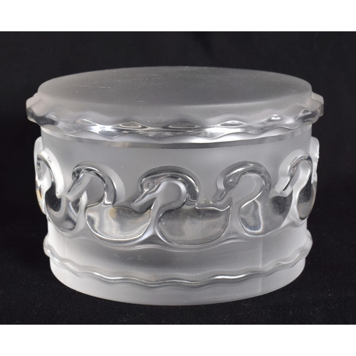 74 - A FRENCH LALIQUE GLASS BOX AND COVER. 9 cm diameter.