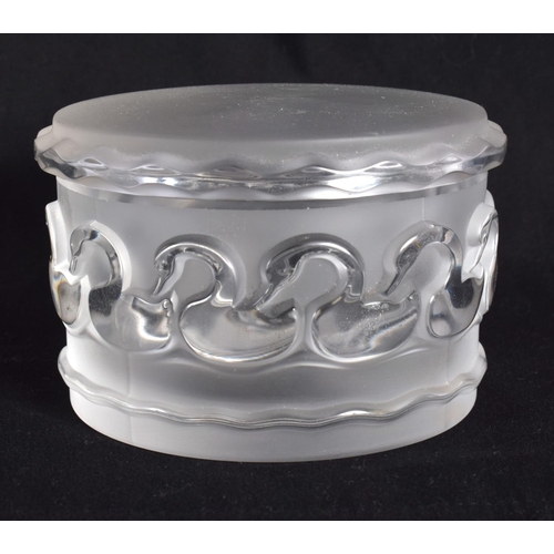 74 - A FRENCH LALIQUE GLASS BOX AND COVER. 9 cm diameter.