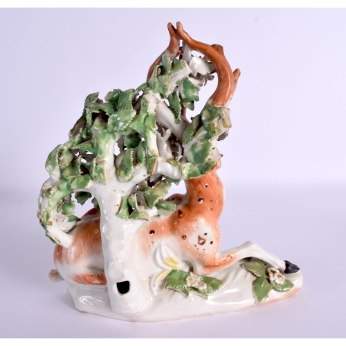 83 - AN 18TH CENTURY DERBY PORCELAIN FIGURE OF A DEER modelled upon a naturalistic base. 18 cm x 18 cm.