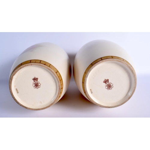 89 - A PAIR OF 19TH CENTURY DOULTON BURSLEM PORCELAIN VASES BY J.P HEWITT each vase with a semi nude fema... 