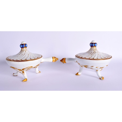 93 - A PAIR OF MARCOLINI MEISSEN PORCELAIN RIBBED POTS & COVERS decorated with a simple floral finial and... 