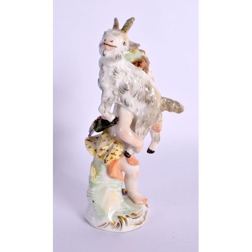 94 - A 19TH CENTURY CONTINENTAL PORCELAIN FIGURE modelled holding a deer. 12 cm high.