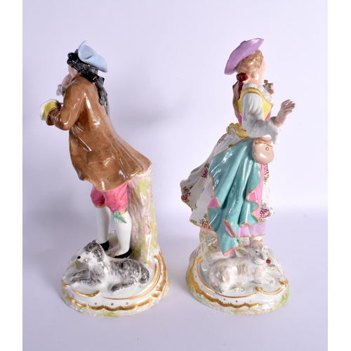 97 - A LARGE PAIR OF LATE 19TH CENTURY EUROPEAN PORCELAIN FIGURES modelled standing over a lamb and hound... 