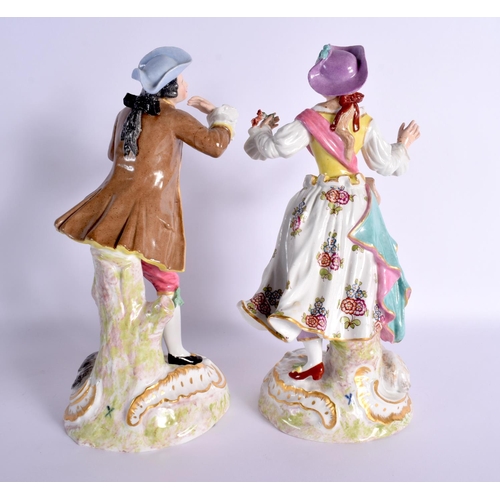 97 - A LARGE PAIR OF LATE 19TH CENTURY EUROPEAN PORCELAIN FIGURES modelled standing over a lamb and hound... 