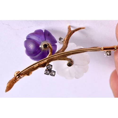 1094 - AN 18CT GOLD BROOCH WITH AMETHYST AND ROCK CRYSTAL BLOSSOM INSET WITH DIAMONDS.  Stamped 18K, 6.2cm ... 