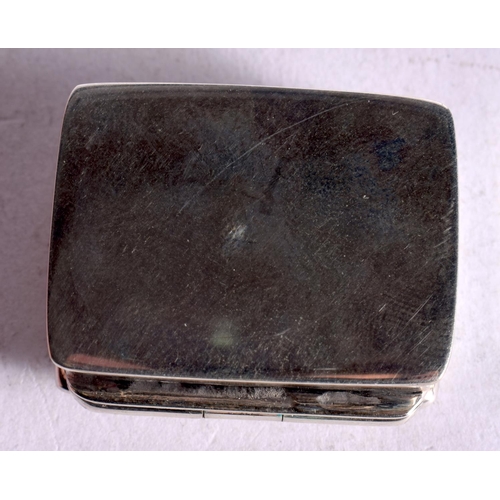 1096 - A SILVER PILL BOX WITH A SCANTILY CLAD WOMAN ON THE LID.  Stamped 925, 1.3cm x 2.6cm x 3.2cm, weight... 