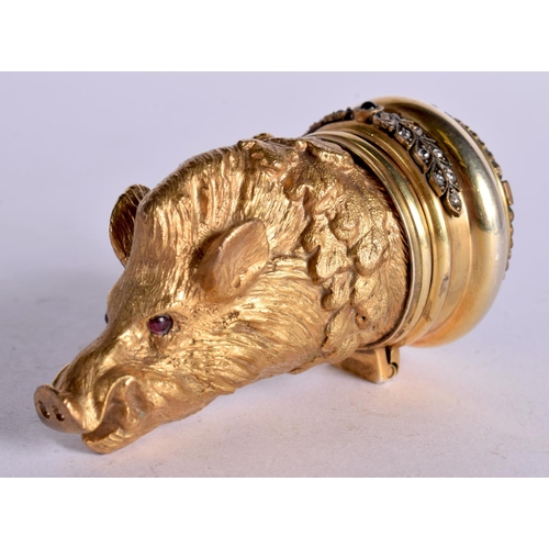 1103 - A CONTINENTAL SILVER GILT BOX MODELLED IN THE FORM OF A BOARS HEAD WITH AN ENAMEL TOP SET WITH PRECI... 