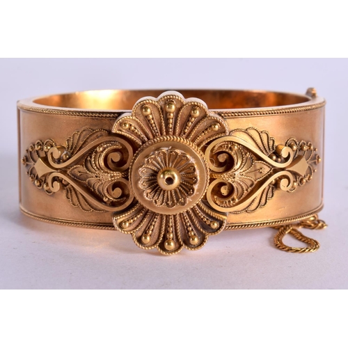 1105 - A HIGH CARAT VICTORIAN GOLD BANGLE.  Internal diameter 5.5cm x 4.2cm, weight 39.8g