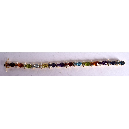 1111 - AN 18CT GOLD AND DIAMOND BRACELET WITH PRECIOUS GEM INSETS.  Stamped 18K, Length 18.5cm, weight 32.7... 