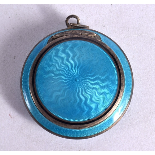 1252 - A PENDANT IN THE FORM OF A GUILLOCHE ENAMEL COMPACT,  4.2cm diameter, weight 26g