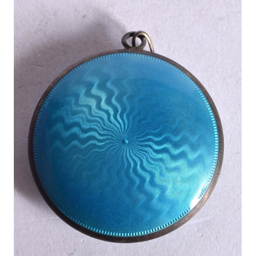 1252 - A PENDANT IN THE FORM OF A GUILLOCHE ENAMEL COMPACT,  4.2cm diameter, weight 26g