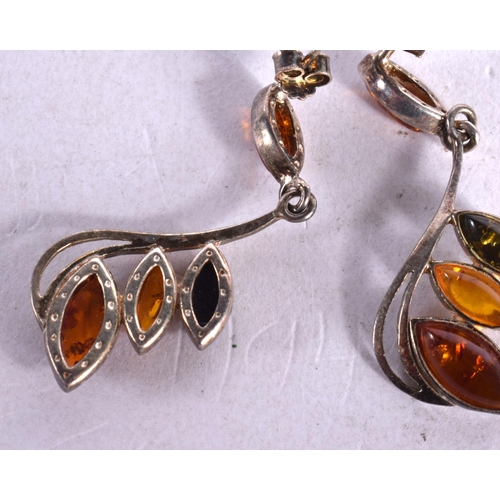 1260 - A PAIR OF AMBER EARRINGS.  4.2cm drop, weight 7g