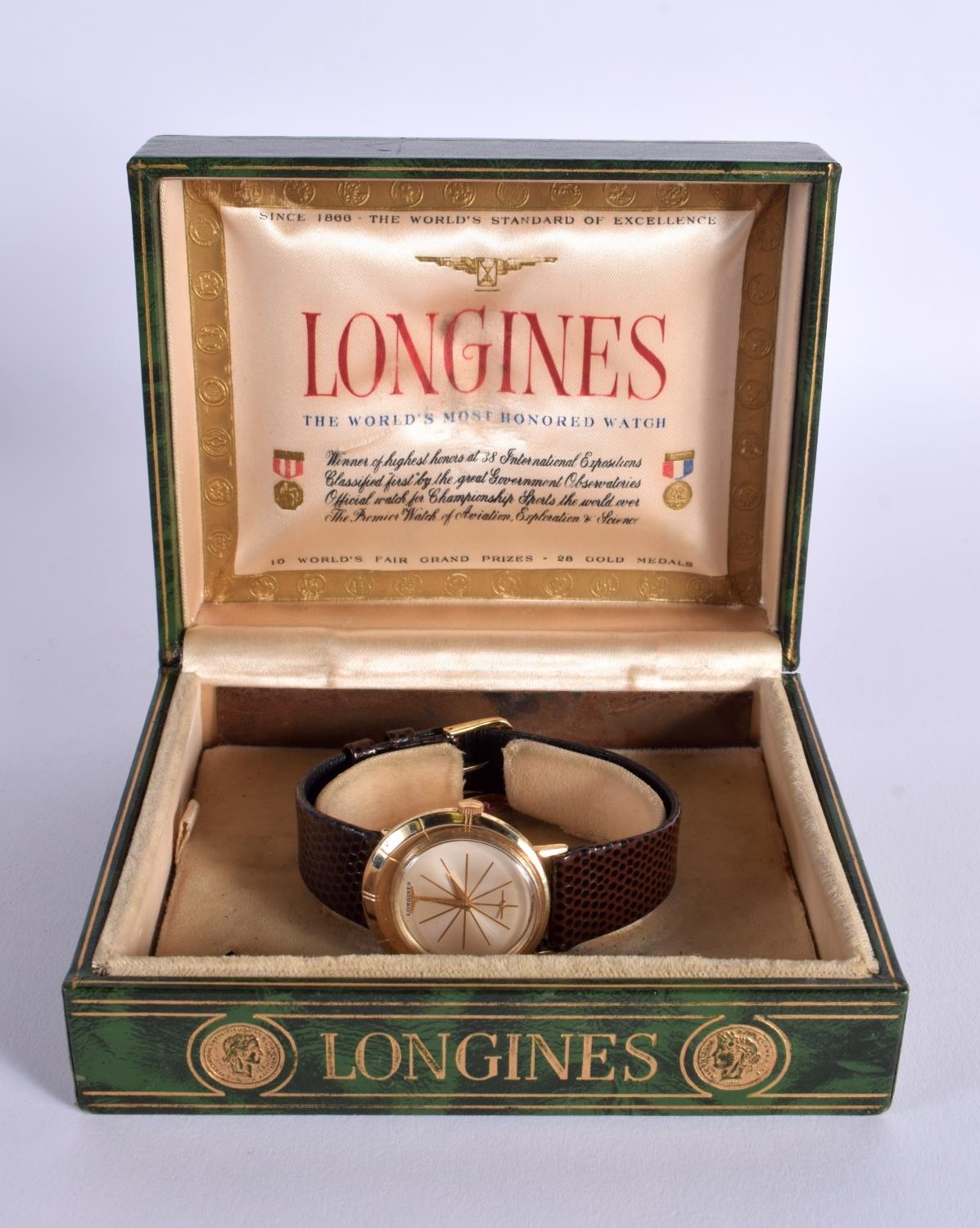 A BOXED LONGINES 1959 VINTAGE 10 CT GOLD FILLED WATCH STARBURST