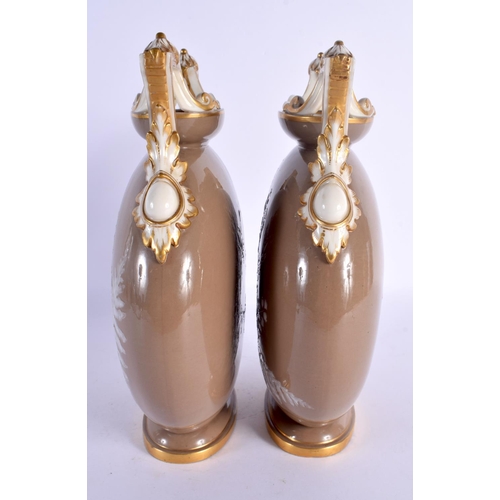 104 - A FINE PAIR OF 19TH CENTURY ENGLISH PATE SUR PATE FLASKS Attributed to Minton, enamelled with foliag... 