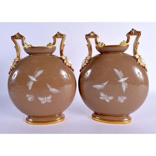 104 - A FINE PAIR OF 19TH CENTURY ENGLISH PATE SUR PATE FLASKS Attributed to Minton, enamelled with foliag... 