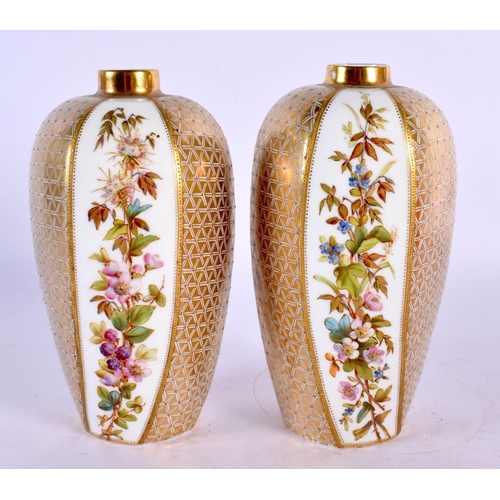 115 - 19th century Coalport rare pair of vases painted with an alternating panel of flowers and raised gil... 