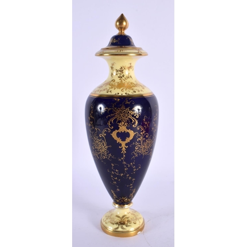 117 - Late 19th / early 20th century Coalport vase and cover with ivory and cobalt blue ground with raised... 