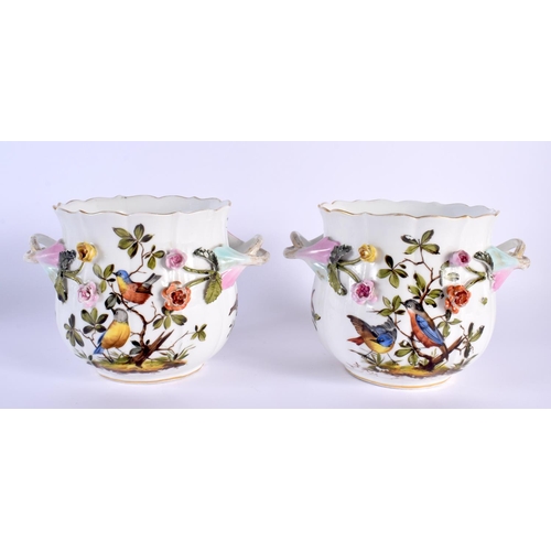 12 - A PAIR OF 19TH CENTURY GERMAN TWIN HANDLED ENCRUSTED PORCELAIN JARDINIERES painted with birds. 17 cm... 