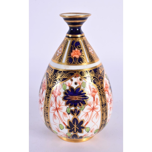 120 - Royal Crown Derby vase painted with pattern 1128, date mark for  1915. 11cm High