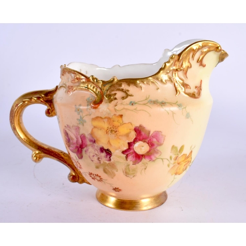 138 - Royal Worcester jug of Empress shape painted with flowers on a blush ivory ground date mark 1897. 10... 