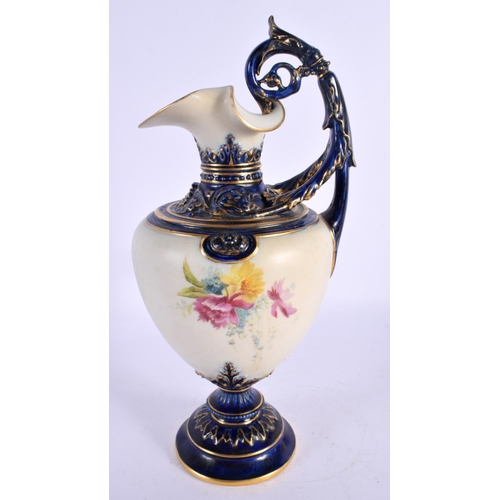 176 - Royal Worcester ewer shape 1309 painted with flowers on an ivory ground, the handle, neck and base p... 